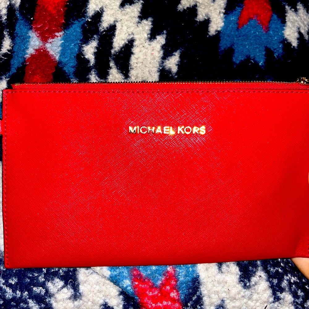- Ruby red Micheal Kors Wrislet